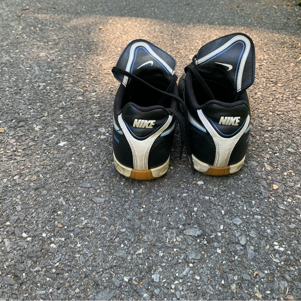 Nike Black and White Sneakers with V-Shaped Heel Design